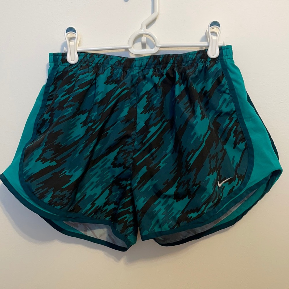 Green, teal, and black Nike Dri-fit tempo shorts